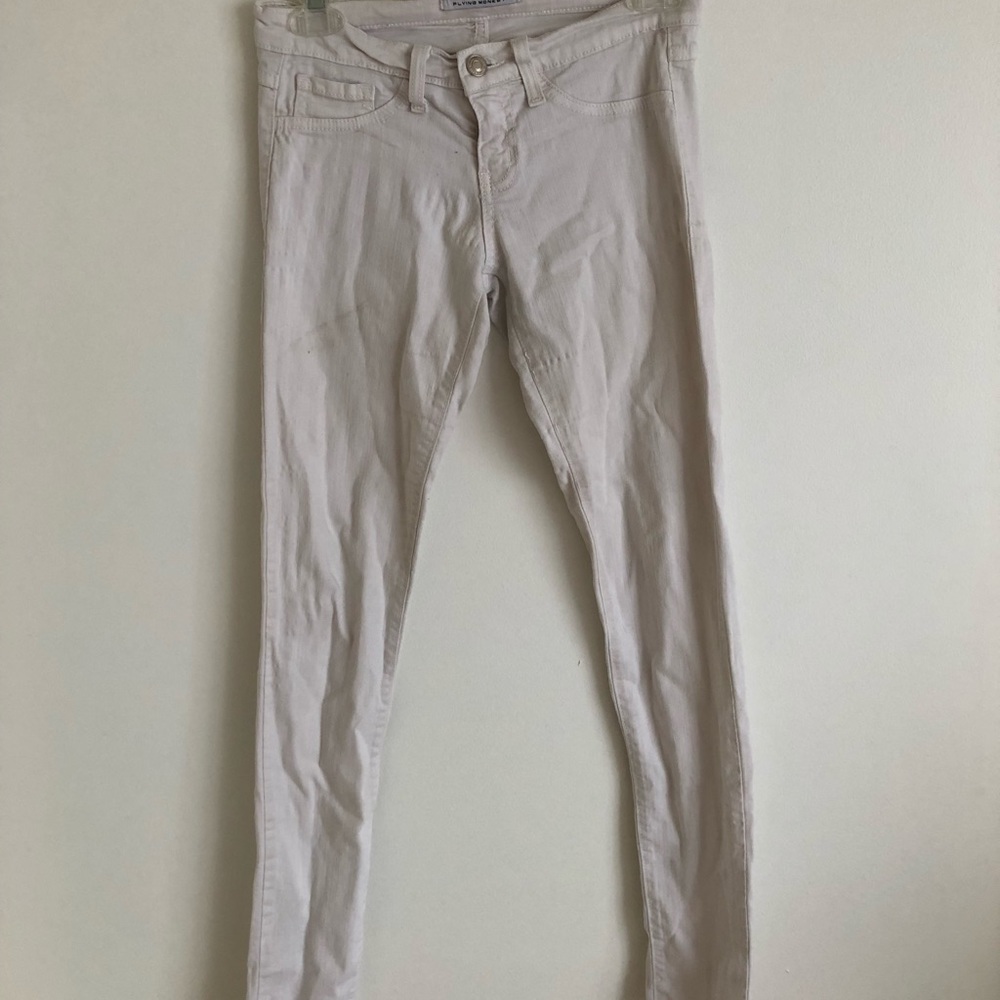 White skinny jeans/jogging a size 0